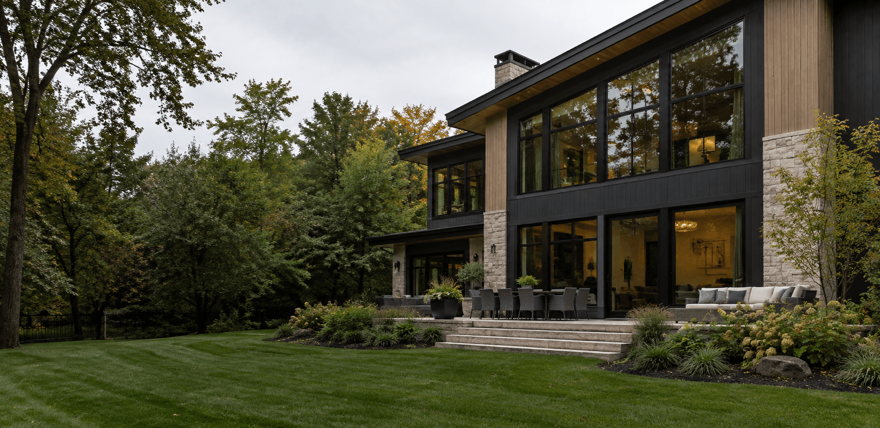 A home exterior with large modern windows